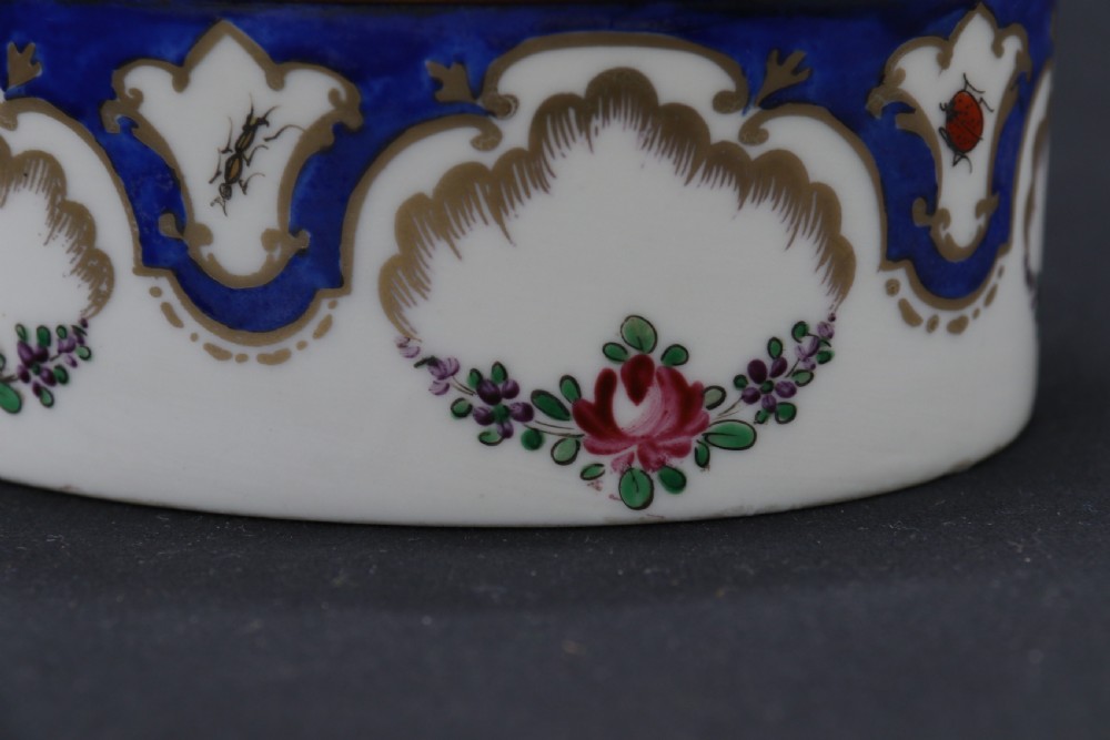 A late 19th century French hand painted porcelain oval box by Samson of Paris View XI