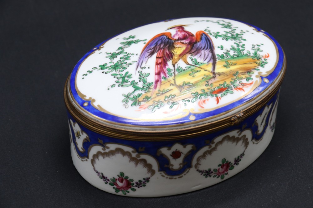 A late 19th century French hand painted porcelain oval box by Samson of Paris View XII
