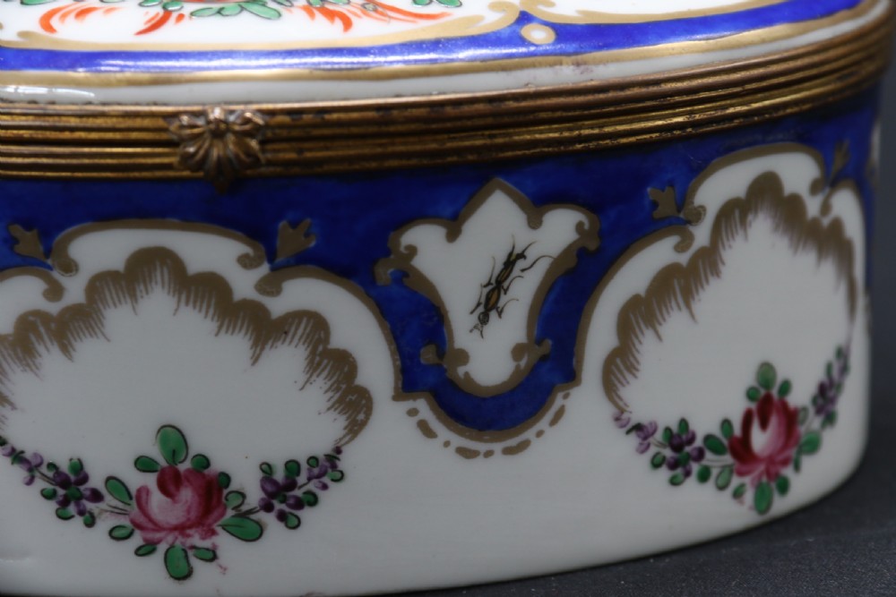 A late 19th century French hand painted porcelain oval box by Samson of Paris View XIV
