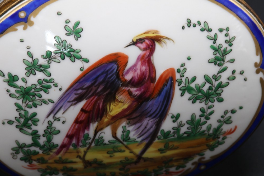 A late 19th century French hand painted porcelain oval box by Samson of Paris View XVII