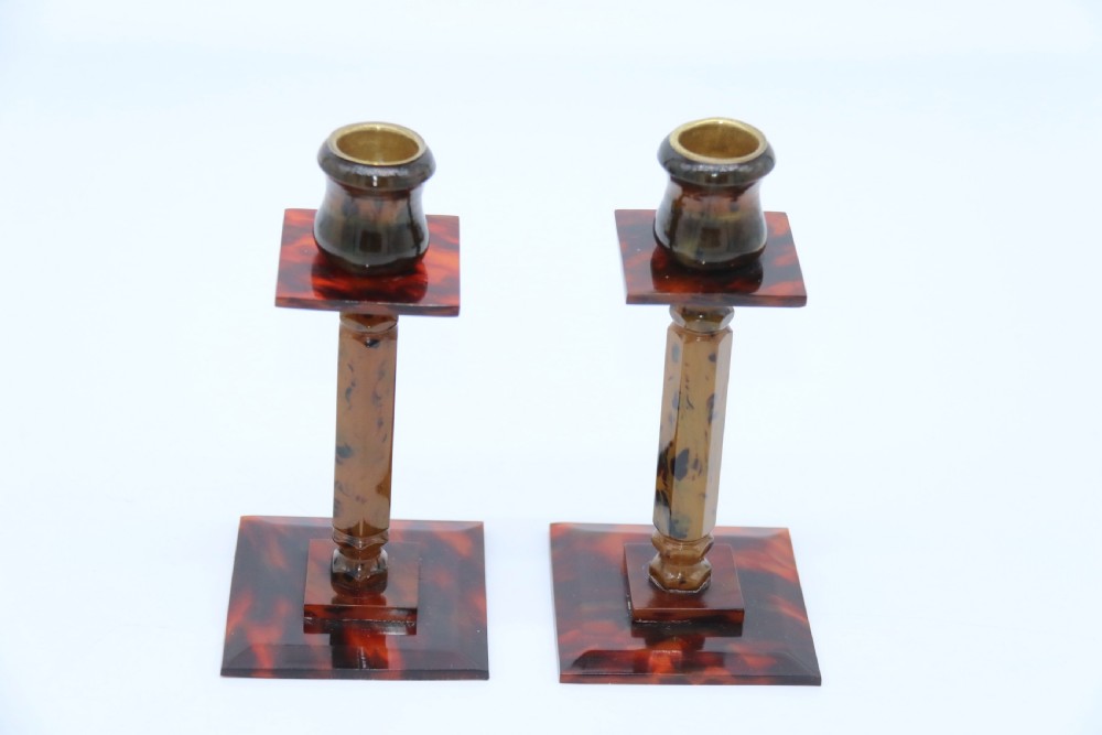 A pair of Art Deco tortoiseshell and clouded butterscotch Bakelite candlesticks View II