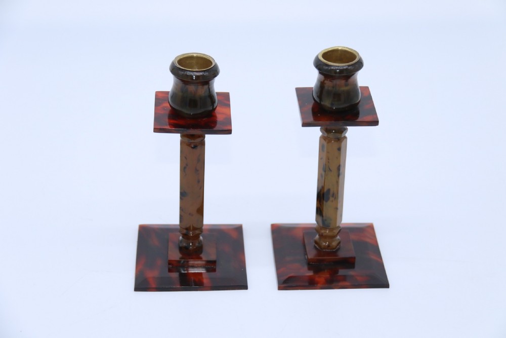 A pair of Art Deco tortoiseshell and clouded butterscotch Bakelite candlesticks View III