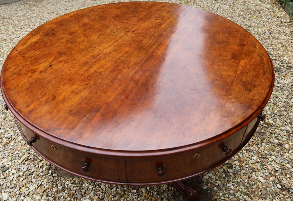 A large high quality mid-19th century figured mahogany library drum table View II