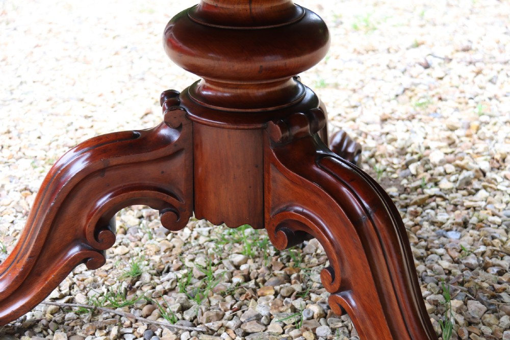 A large high quality mid-19th century figured mahogany library drum table View IV