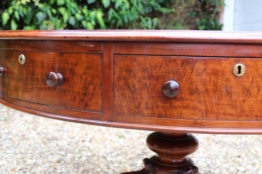 A large high quality mid-19th century figured mahogany library drum table View IX