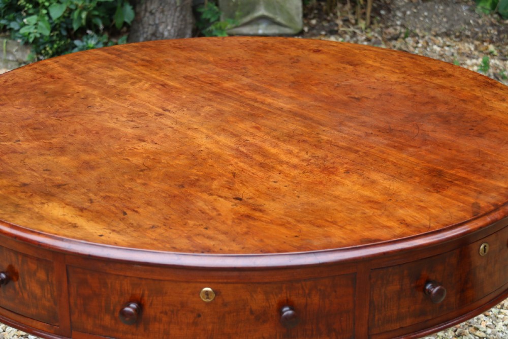 A large high quality mid-19th century figured mahogany library drum table View XI