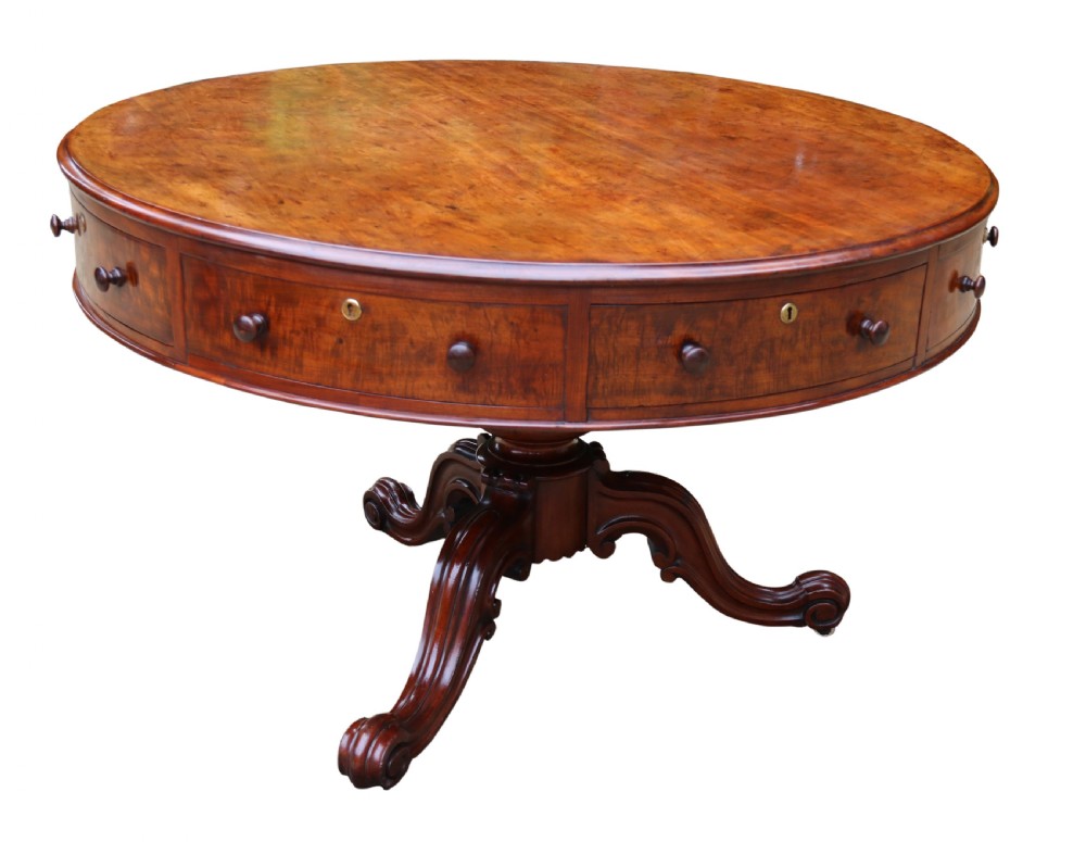 A large high quality mid-19th century figured mahogany library drum table View XV