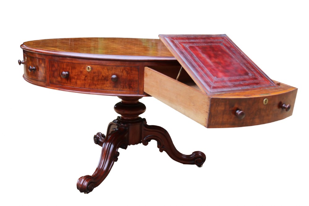 A large high quality mid-19th century figured mahogany library drum table View XVI