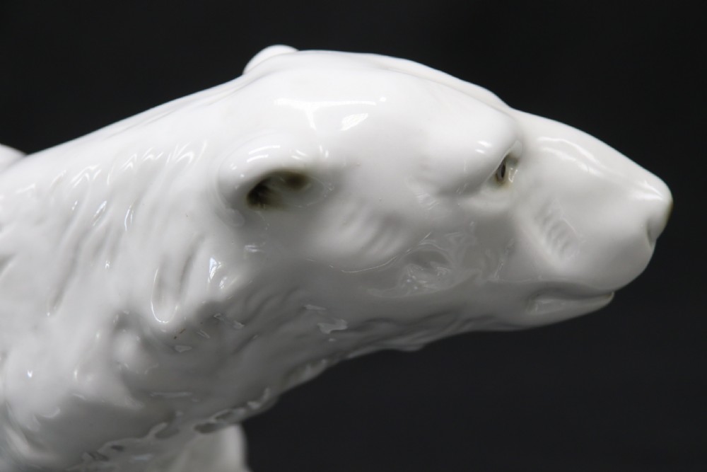 A large Royal Dux porcelain figure of a polar bear.



 View X