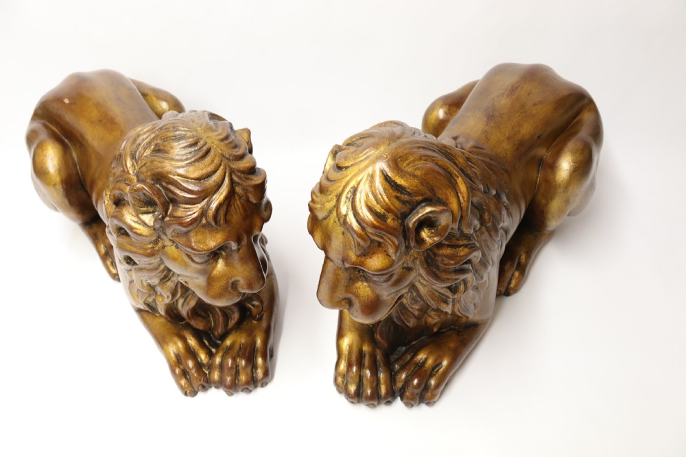 A most impressive 19th century pair of English carved gilt wood classical lions View V