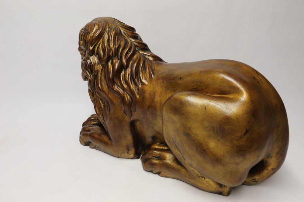 A most impressive 19th century pair of English carved gilt wood classical lions View XXVIII