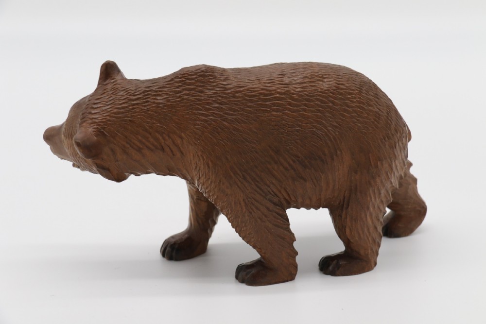 A Swiss Black Forest carved lime wood study of a prowling bear View IV