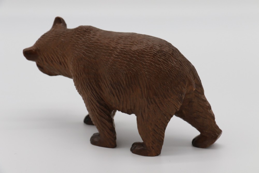 A Swiss Black Forest carved lime wood study of a prowling bear View V