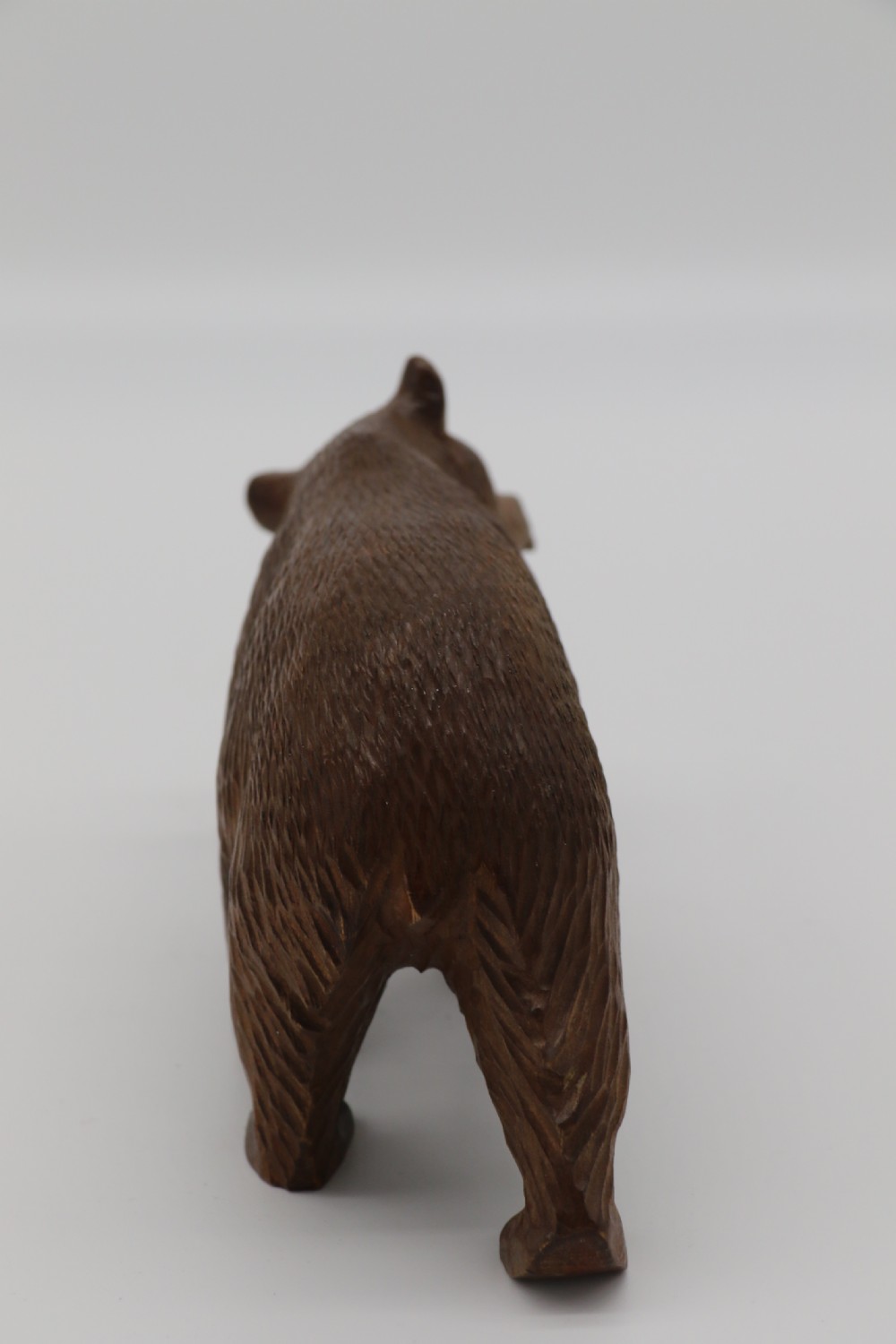 A Swiss Black Forest carved lime wood study of a prowling bear View VII