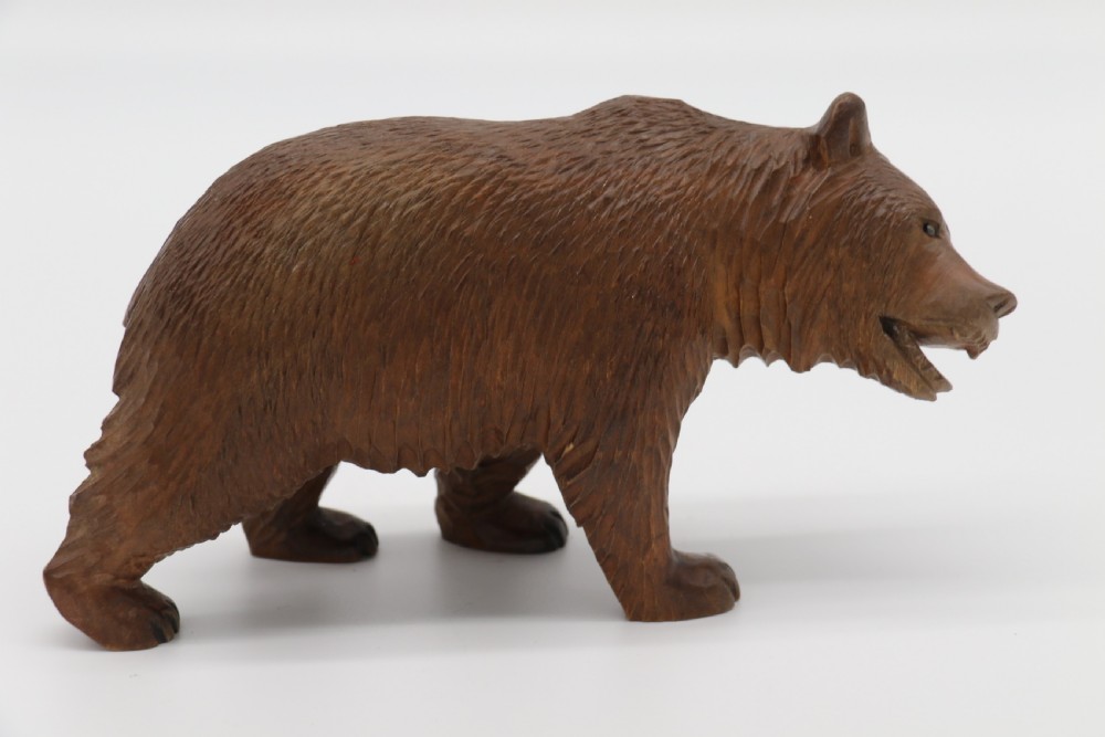A Swiss Black Forest carved lime wood study of a prowling bear View VIII