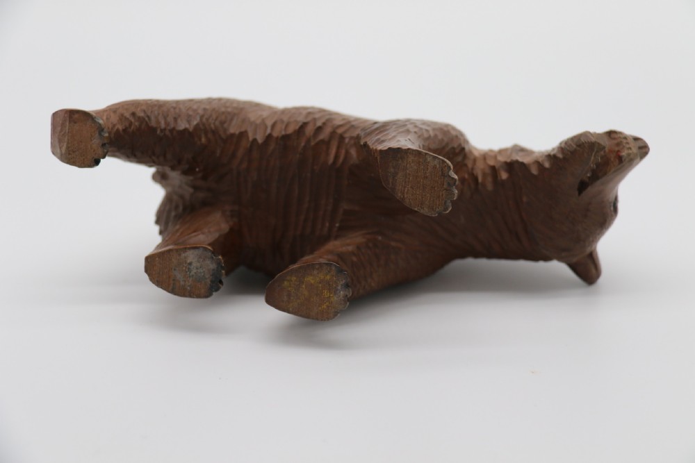 A Swiss Black Forest carved lime wood study of a prowling bear View XI