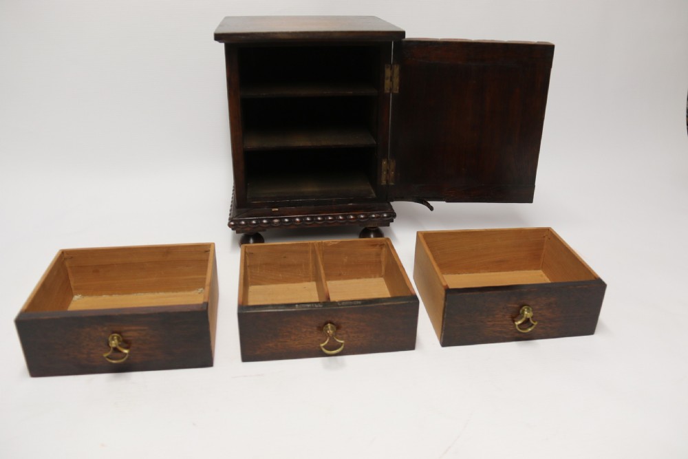 early 20th C  Dunhill cabinet, humidor, in the form of a small oak bookcase circa 1920 View X