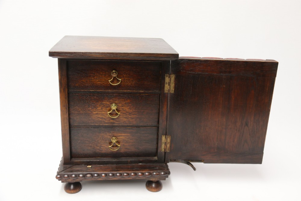 early 20th C  Dunhill cabinet, humidor, in the form of a small oak bookcase circa 1920 View XII