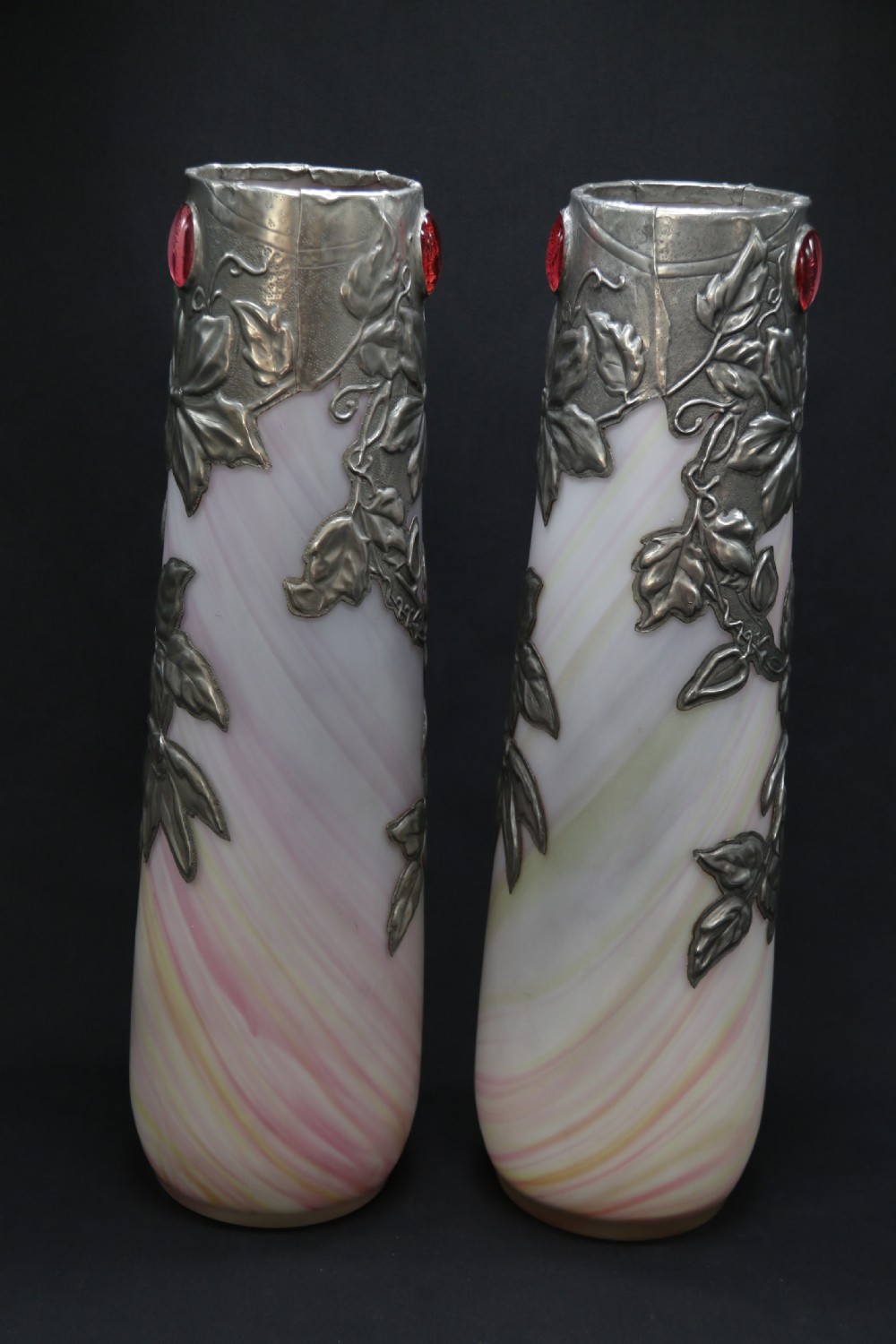 A large pair of Arts and Crafts glass vases with pewter overlaid decoration View II