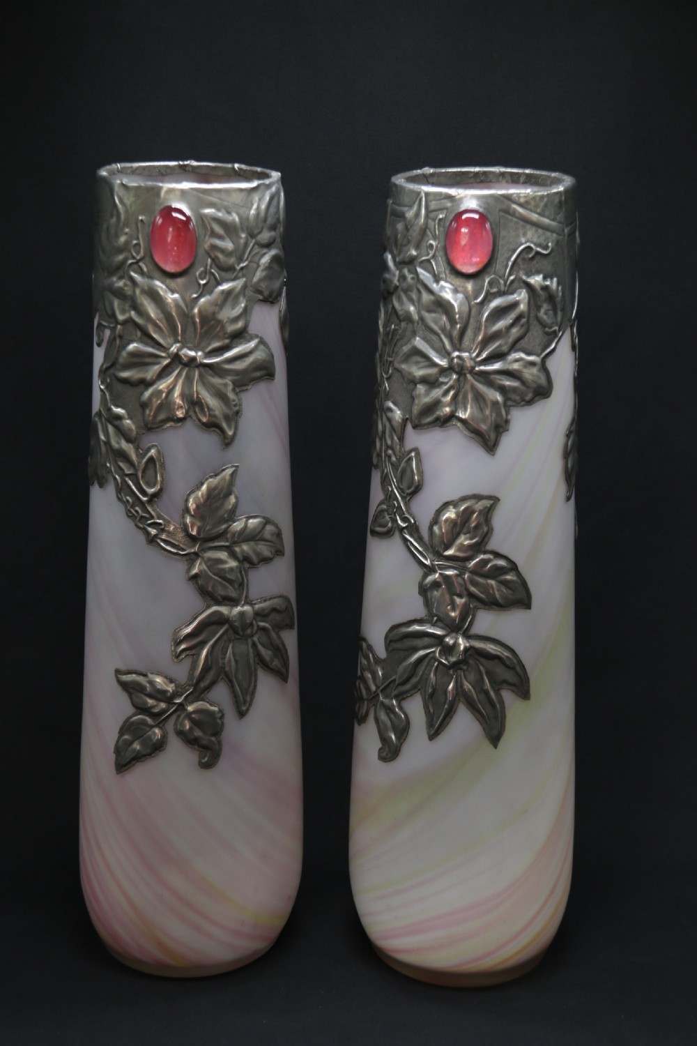 A large pair of Arts and Crafts glass vases with pewter overlaid decoration View III