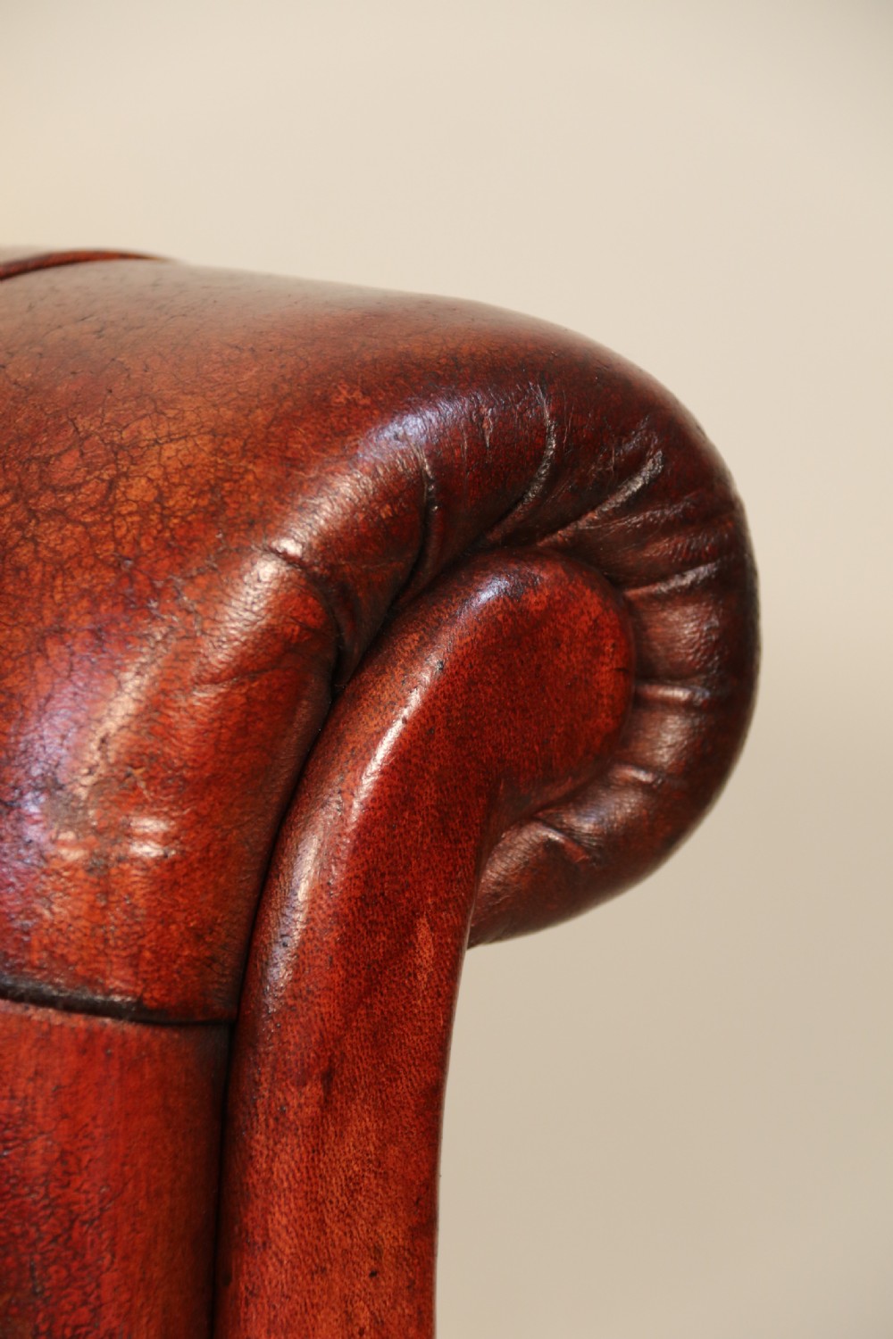 A fully adjustable early 20th C deep buttoned leather upholstered desk chair View XIX
