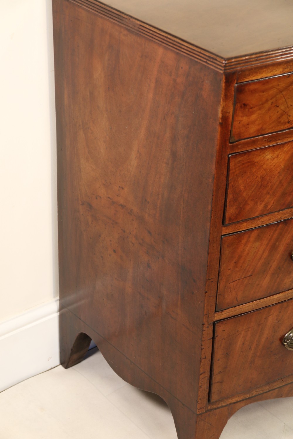Antique Regency period flame mahogany small bow fronted chest of drawers View XVI