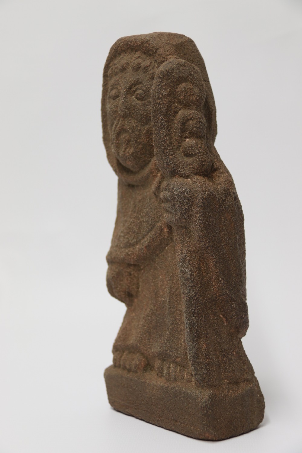 A primitive carved sandstone Celtic style figure, circa 1890 View II