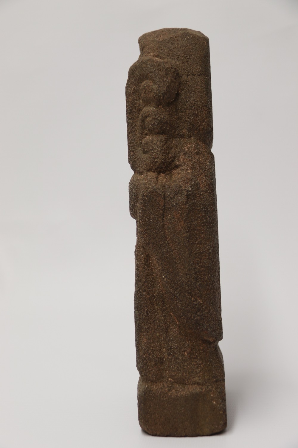A primitive carved sandstone Celtic style figure, circa 1890 View III