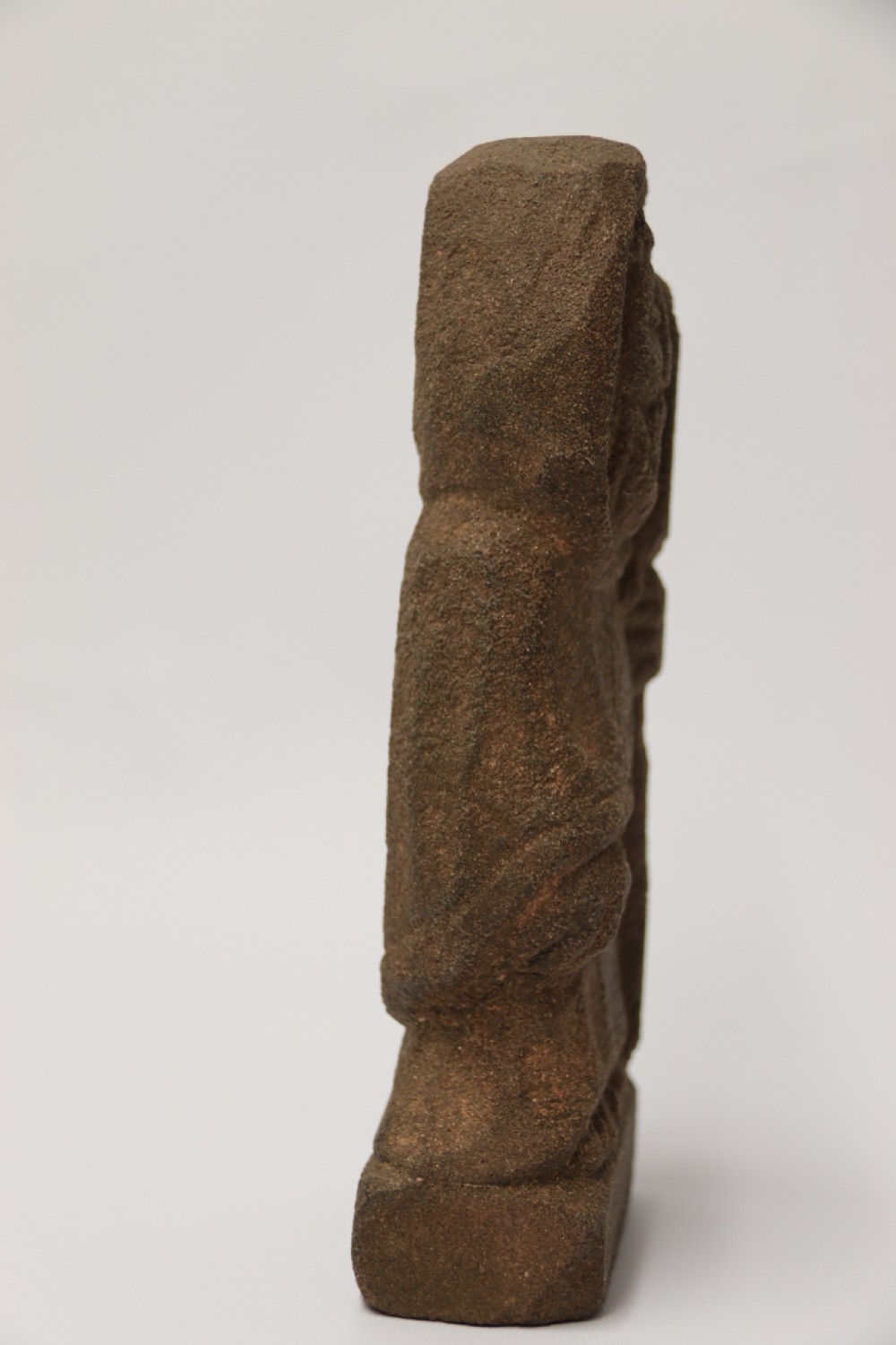 A primitive carved sandstone Celtic style figure, circa 1890 View VI