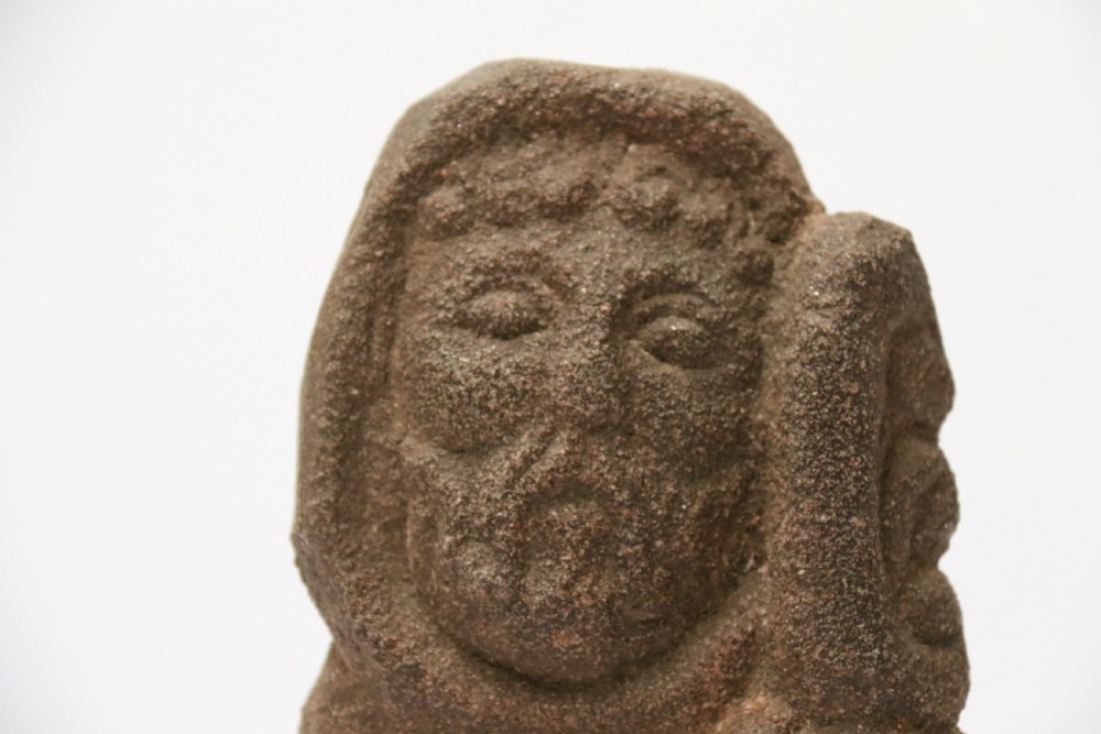 A primitive carved sandstone Celtic style figure, circa 1890 View VIII