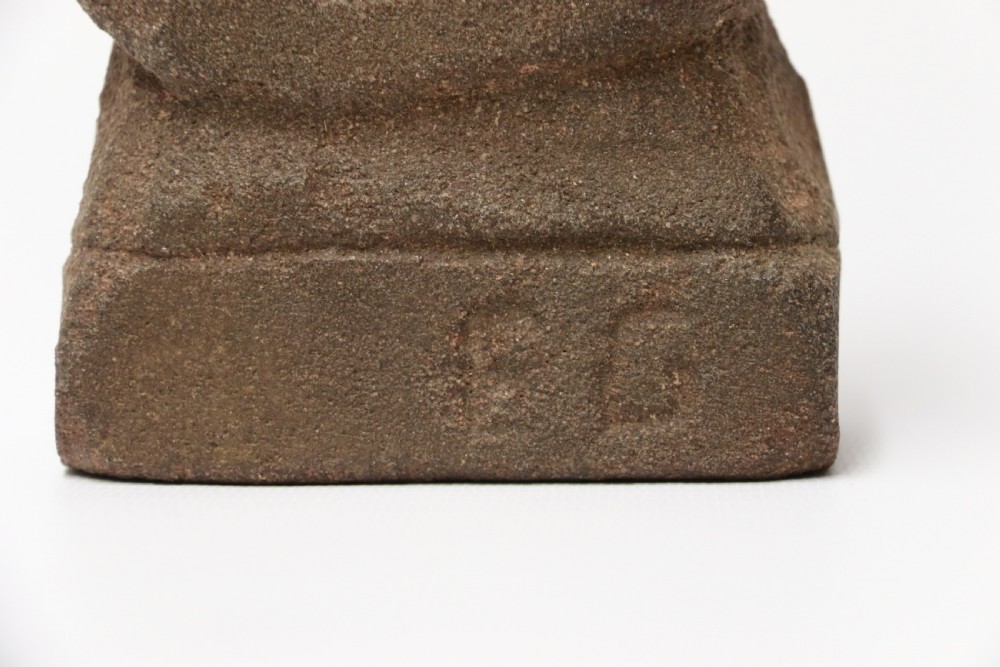 A primitive carved sandstone Celtic style figure, circa 1890 View X