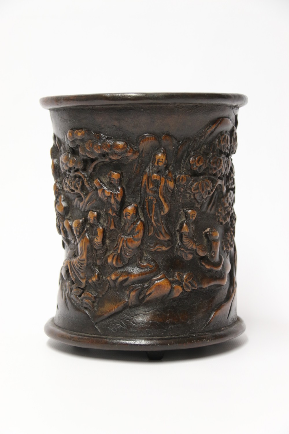 A Chinese carved bamboo and hardwood brush pot