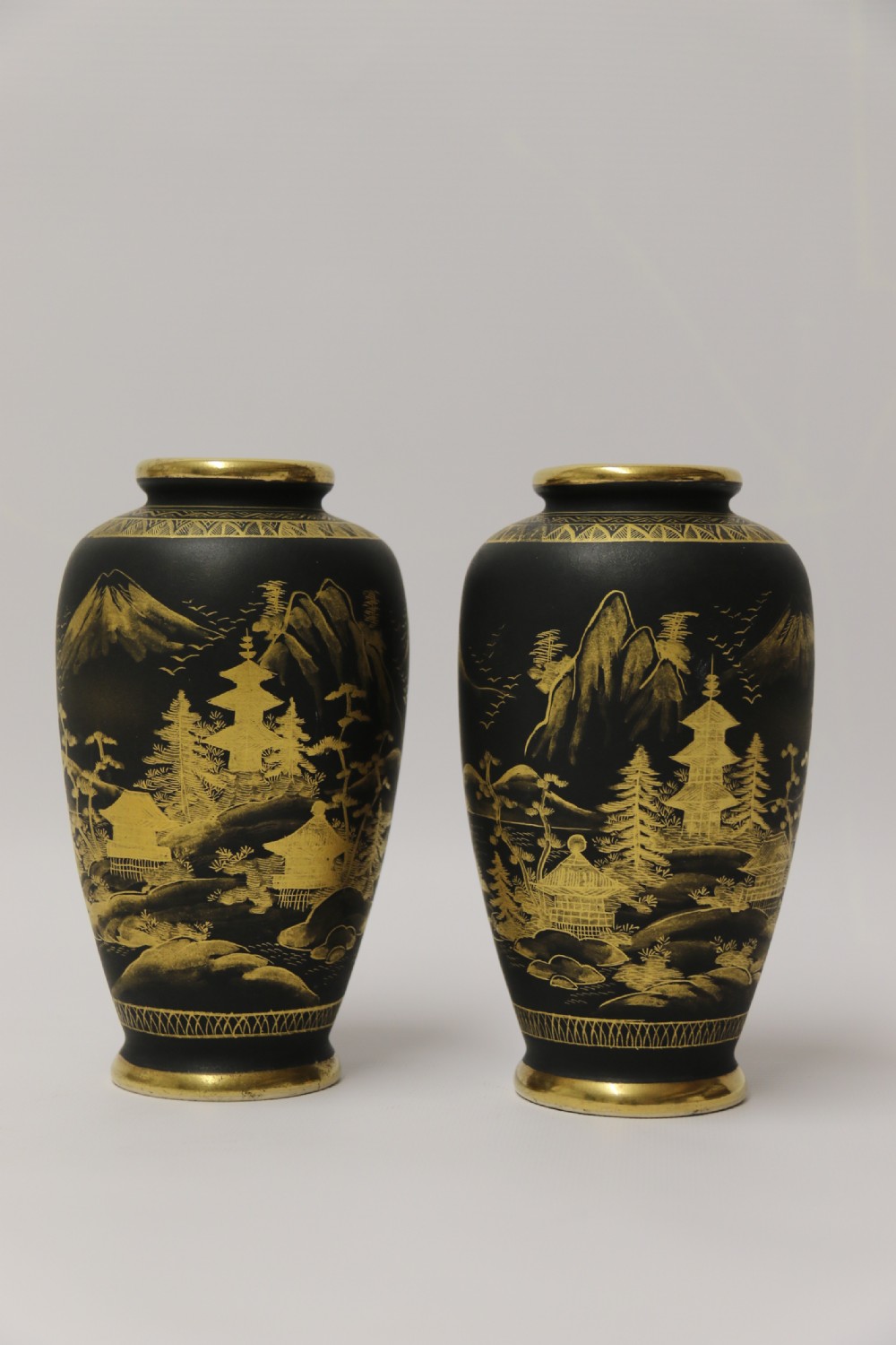 A pair of Japanese Satsuma ware pottery vases, circa 1910