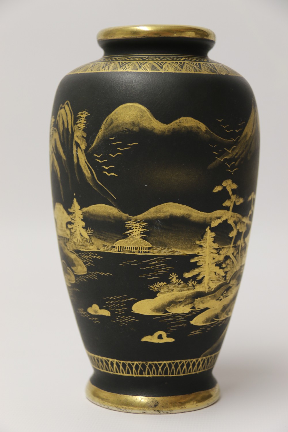 A pair of Japanese Satsuma ware pottery vases, circa 1910 View VIII