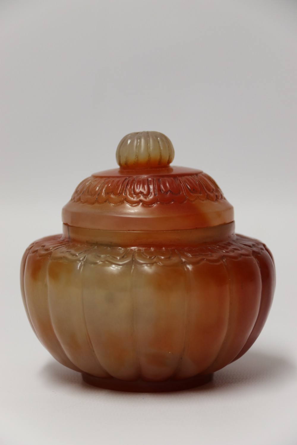 A Chinese hand cut and carved solid agate jar and cover View III