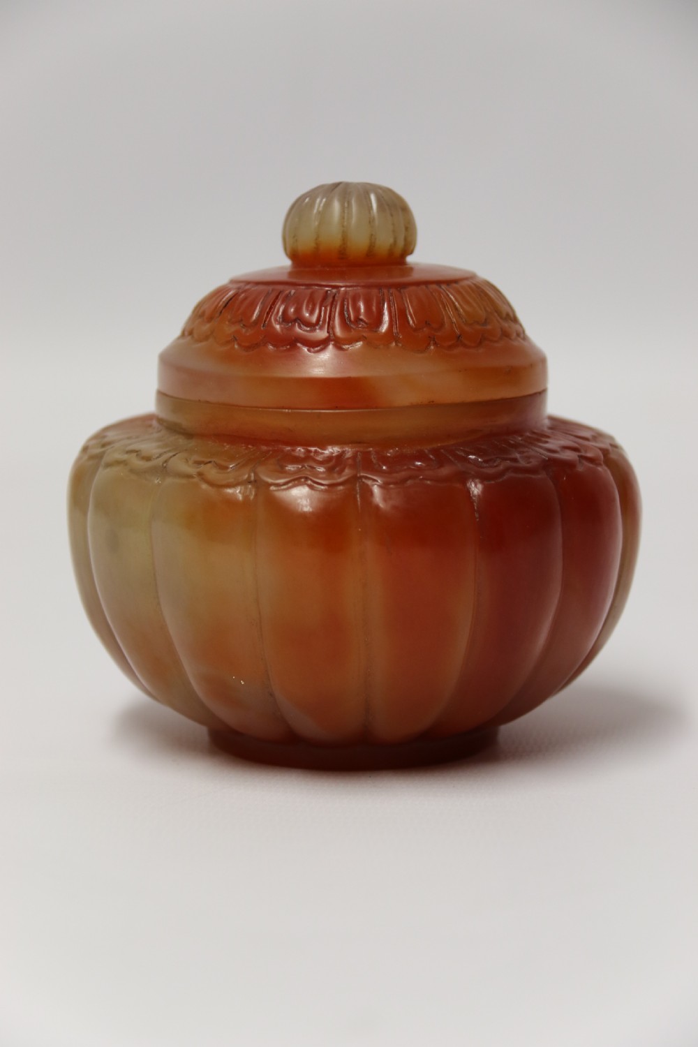 A Chinese hand cut and carved solid agate jar and cover View IV