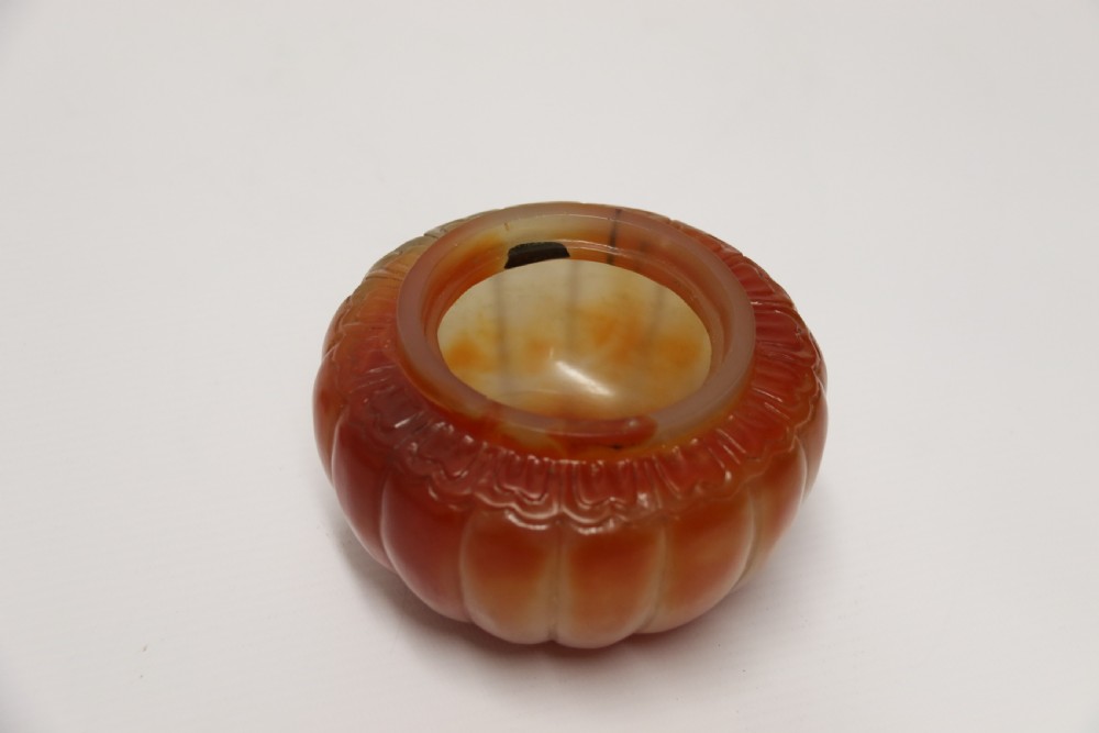 A Chinese hand cut and carved solid agate jar and cover View VII