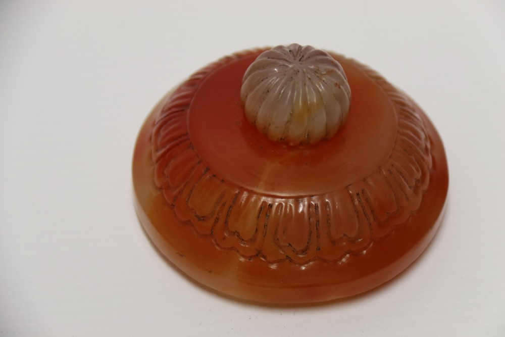 A Chinese hand cut and carved solid agate jar and cover View VIII