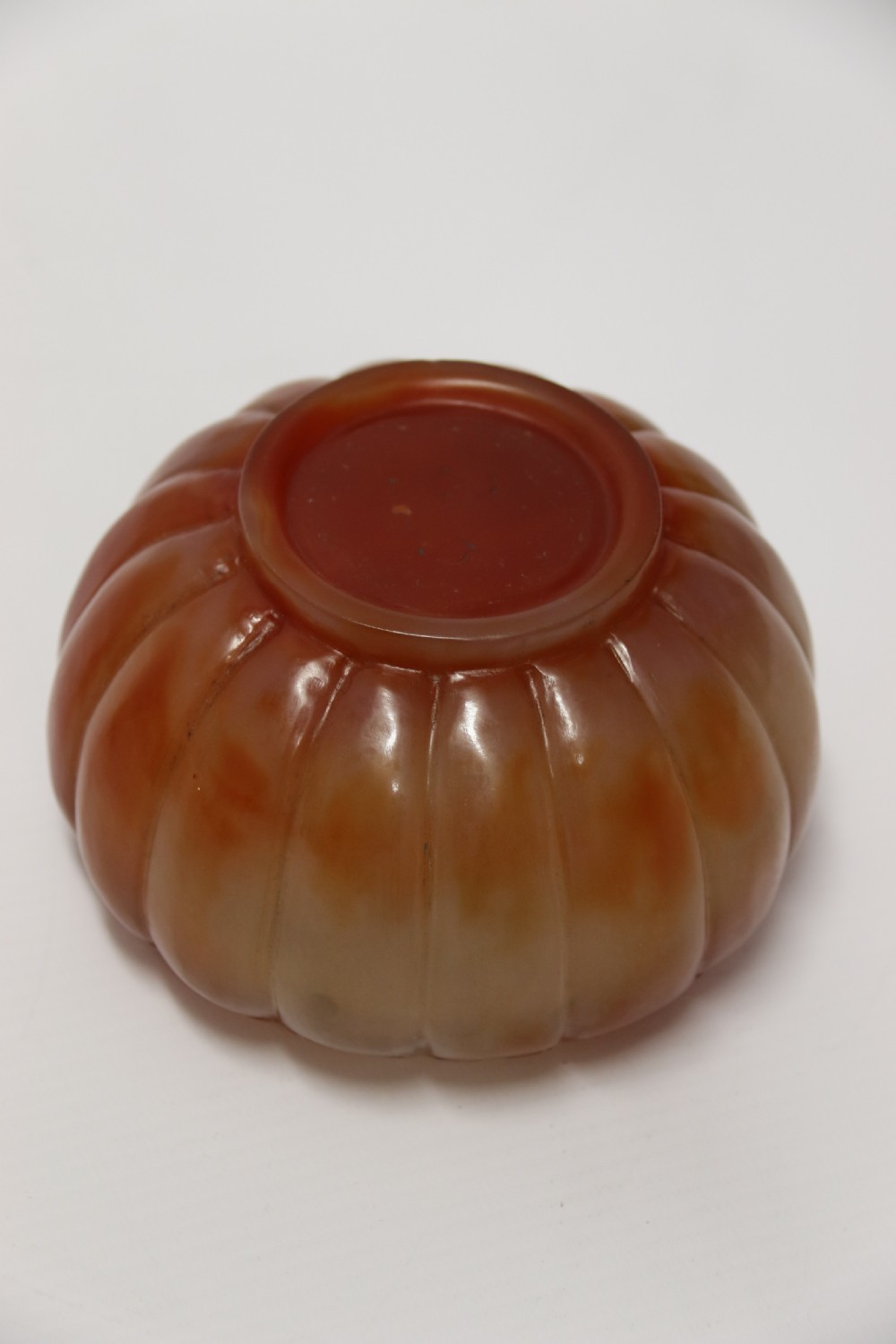 A Chinese hand cut and carved solid agate jar and cover View IX
