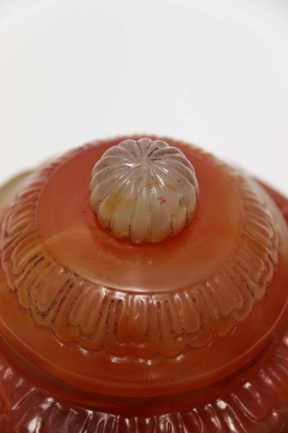 A Chinese hand cut and carved solid agate jar and cover View XII