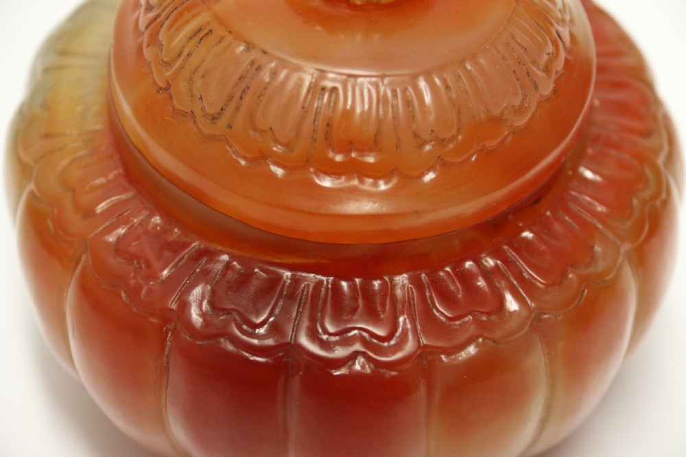 A Chinese hand cut and carved solid agate jar and cover View XIII