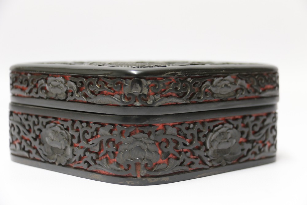 A fine quality 19th century Chinese carved red and black lacquer box View III