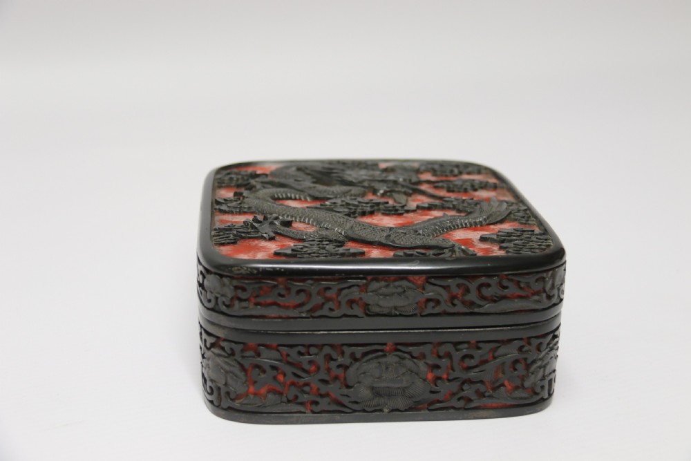 A fine quality 19th century Chinese carved red and black lacquer box View VII