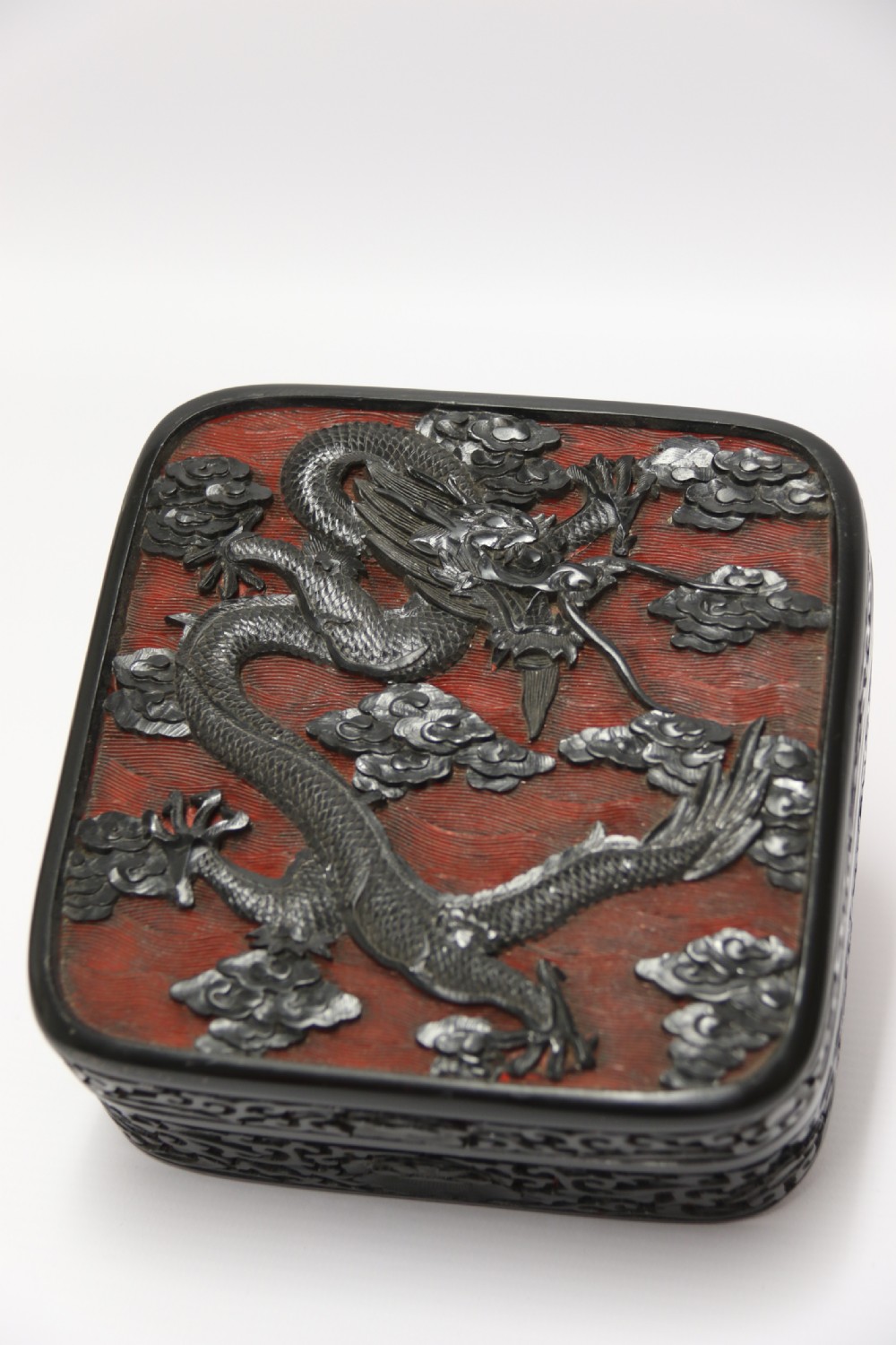 A fine quality 19th century Chinese carved red and black lacquer box View VIII