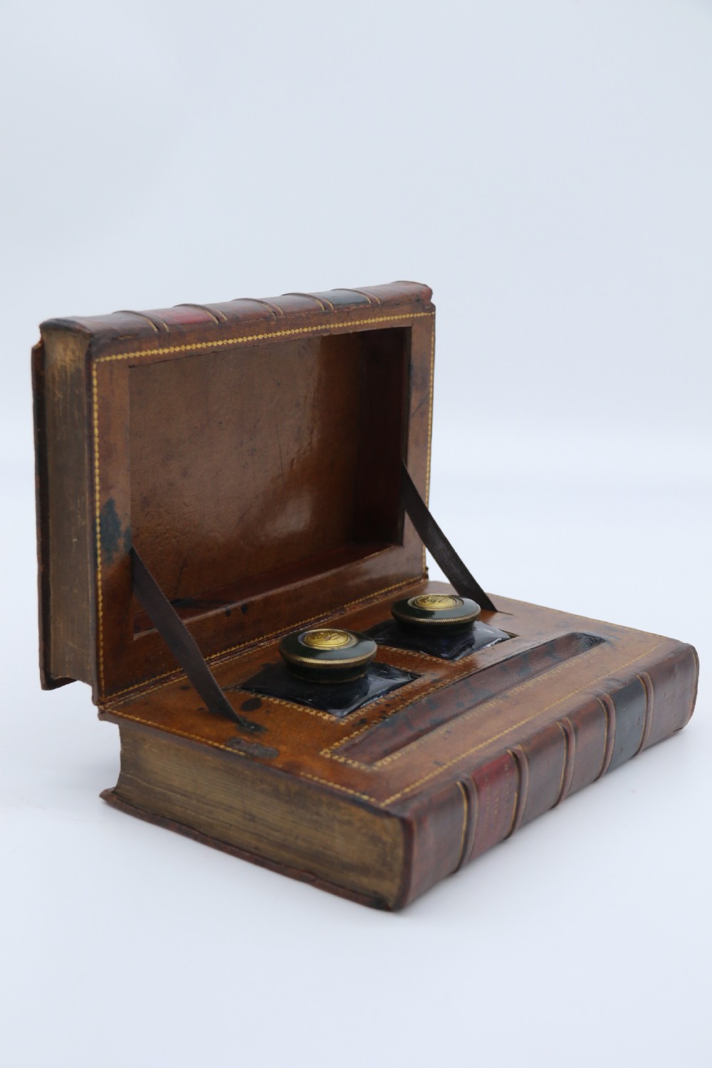 A rare 19th century desk pen and inkstand made in the form of two leather bound books. View II