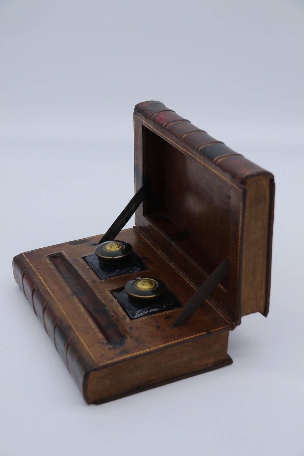 A rare 19th century desk pen and inkstand made in the form of two leather bound books. View VI