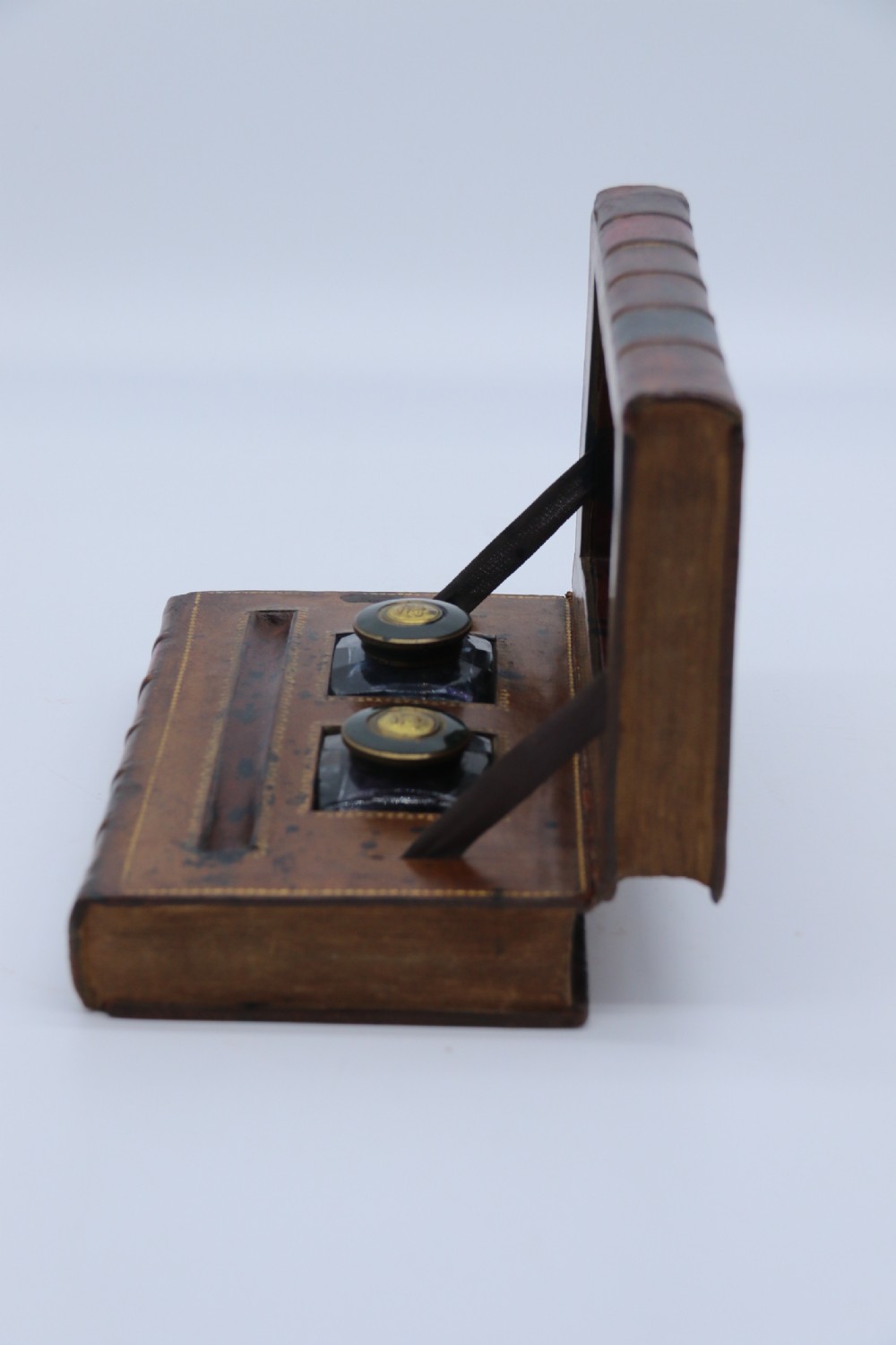 A rare 19th century desk pen and inkstand made in the form of two leather bound books. View VII