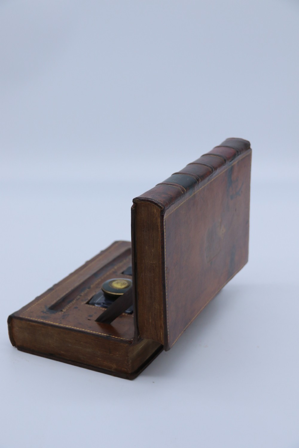 A rare 19th century desk pen and inkstand made in the form of two leather bound books. View VIII