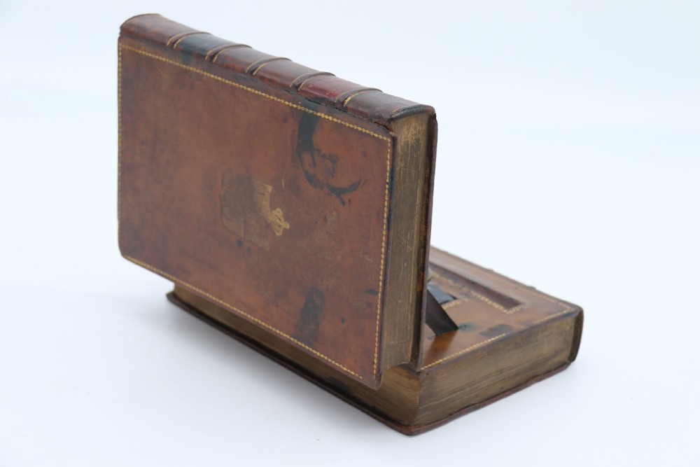A rare 19th century desk pen and inkstand made in the form of two leather bound books. View X