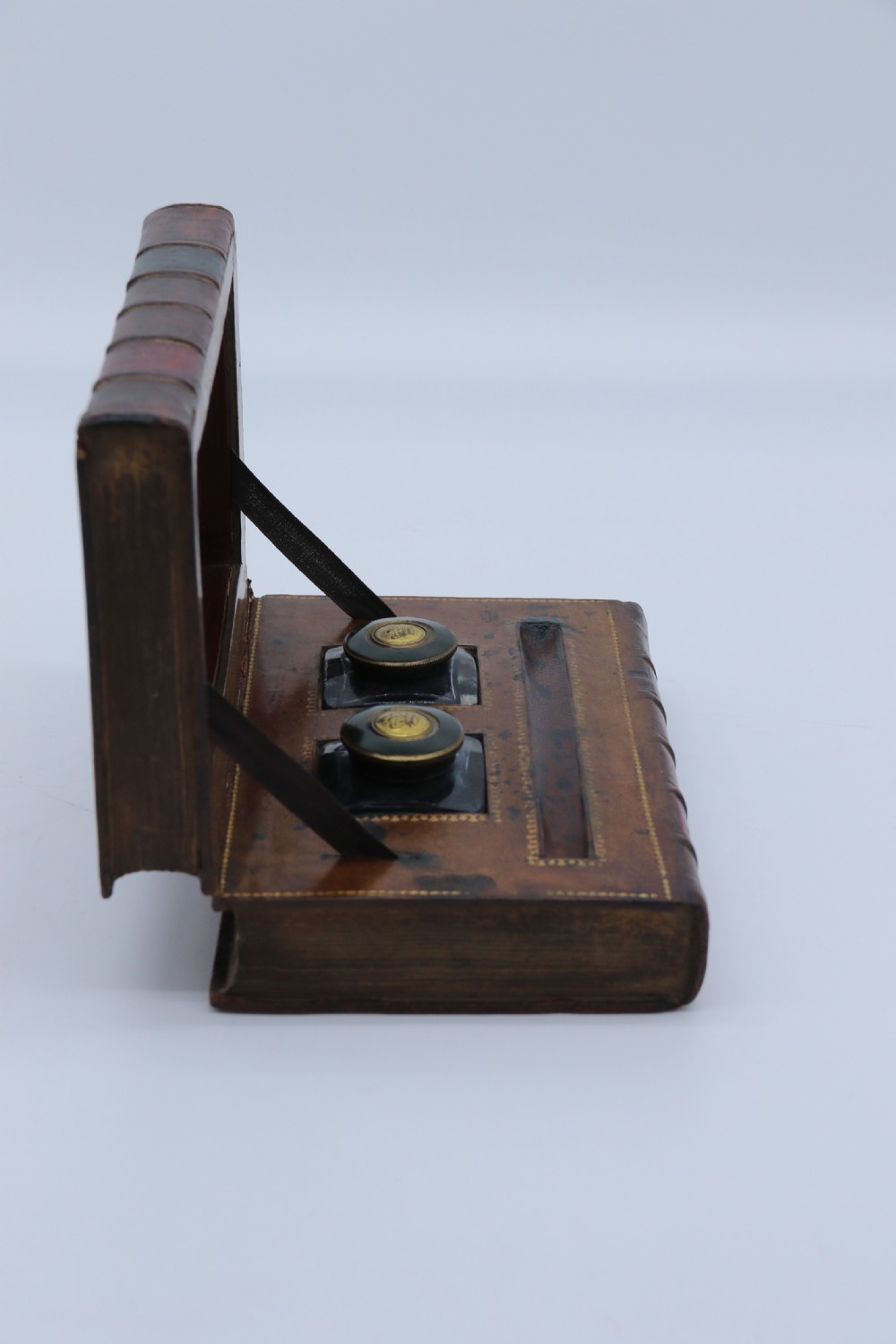 A rare 19th century desk pen and inkstand made in the form of two leather bound books. View XVI